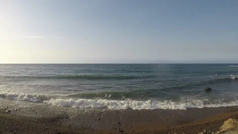 Nice day on wavey beach Video stock 147263980