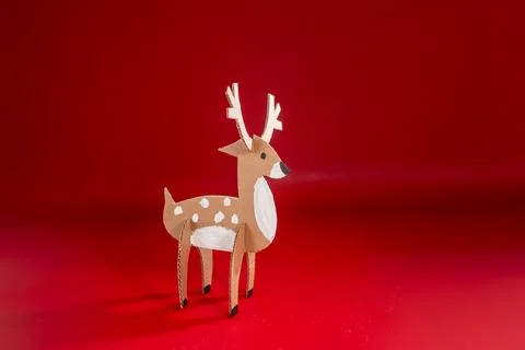 Nice deer or doe, all parts assembled with notches, 3D paper model, cut and.. Stock Photos