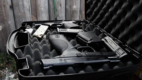 Nice display of guns in their case Stock Footage 114213901