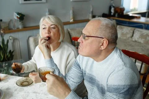 Nice elderly couple together on a white background Stock Photos