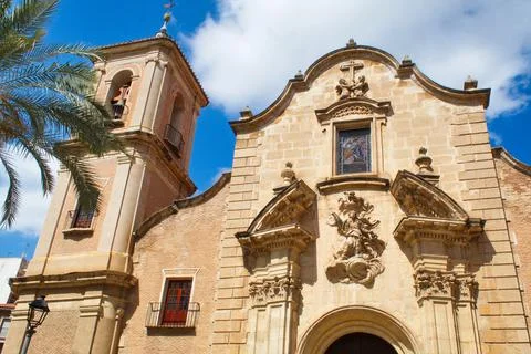 Nice facade with tower and bell tower of the church of Santa Eulalia in Murcia Stock Photos