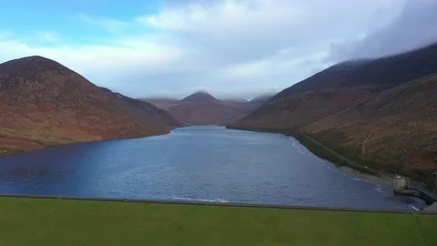 Nice Flight over Silent Valley Reservoir, Mourne Mountains, Northern Ireland Stock Footage 232625686