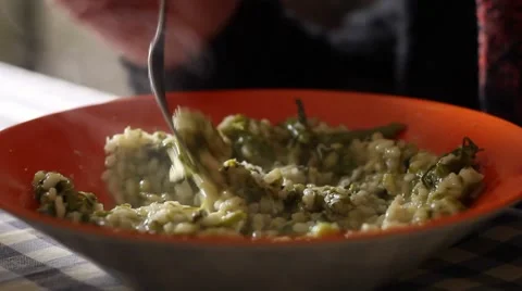 Nice girl eating risotto Stock Footage 49933114