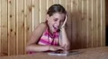 Nice girl playing the game on tablet computer HD Footage