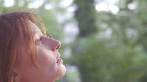 Nice girl playing in park in spring 스톡 동영상 73499495