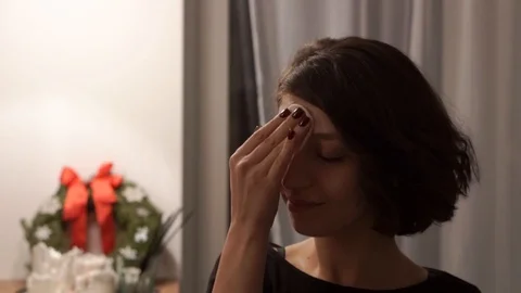 Nice girl remove makeup from her face Stock Footage 100997854