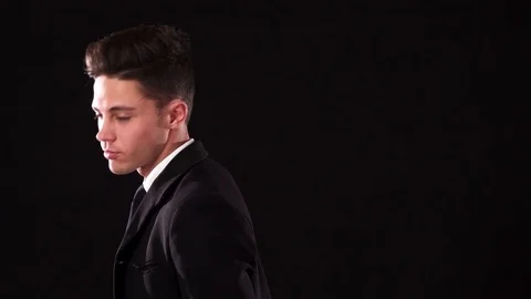 A nice guy is smiling charmingly and winking Video stock 83586692