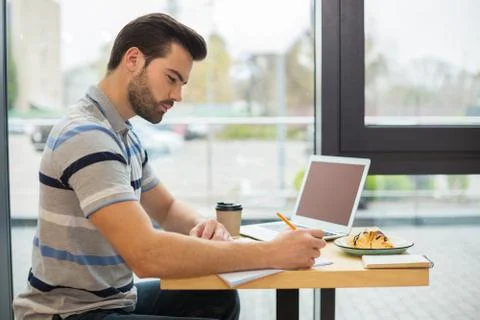 Nice handsome man working Stock Photos