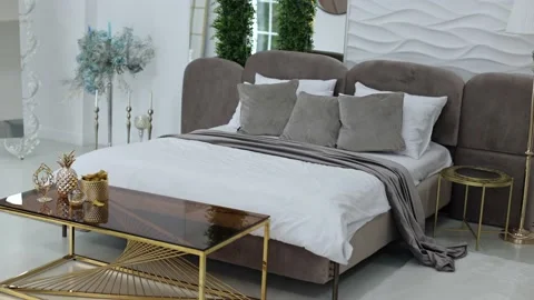 Nice interior in the apartment. Bed, table and many details Stock Footage 205325166