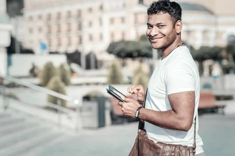 Nice joyful man smiling Stock Photos