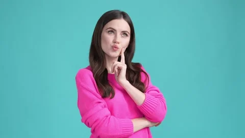 Nice lady decide thought future date isolated cyan color background Stock Footage 192532573