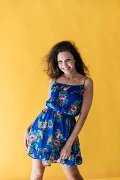 Nice lady overjoyed by warm spring breeze going romantic date wear cute dress Stock Photos
