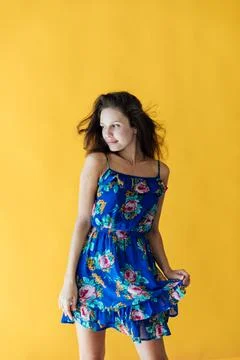Nice lady overjoyed by warm spring breeze going romantic date wear cute dress Stock Photos