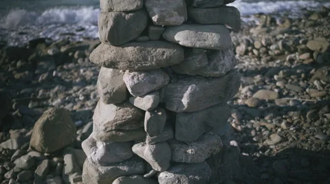 Nice landmark on the beach - pebble tower Stock Footage 67676307
