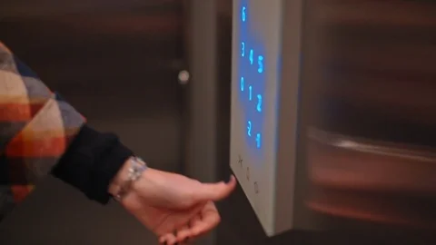 Nice Light Touch Buttons in the Lift with Hand Opening Lift Doors from inside Stock Footage 81561574