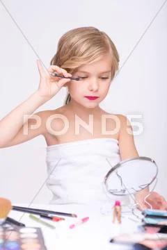 Nice Little Girl Doing Make Up