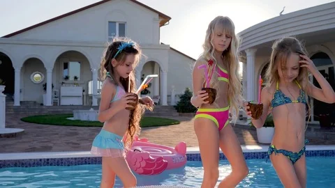 nice little girls near villa with tropic... | Stock Video | Pond5 