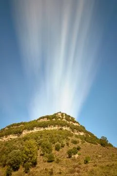 Nice long exposure picture, cloudscape over the mountain Stock Photos