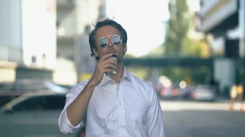 Nice-looking Man Drinking Coffee Stock Footage 126232758