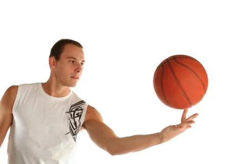 Nice looking man playing ball on his hand Stock Photos