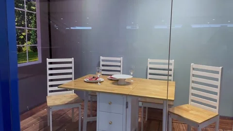 Nice looking wooden dining table and chairs. Stock Footage 320500480