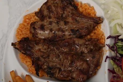 Nice meal two roasted lamb in a plate Stock Photos