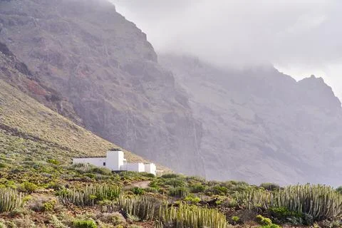 Nice nice house in the mountains. A man lives in the mountains Stock Photos