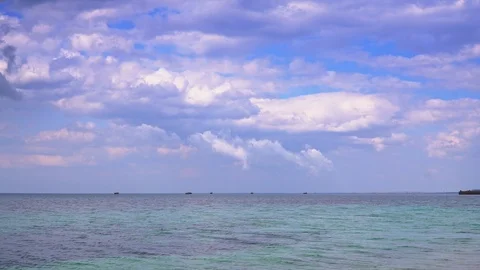 Nice ocean view with incredible clouds on the sky that fly amazingly Stock Footage 105452330