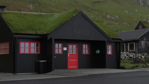 Nice old house which is located in the village of kirkjubour Stock Footage 245615093