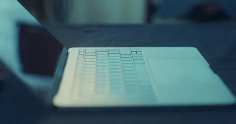 Nice overview of a modern laptop laying on the table Stock Footage 130577773