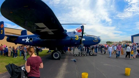 A nice panning Slow Motion shot up to  the front of the B-25 Devil Dog Stock Footage 126043407