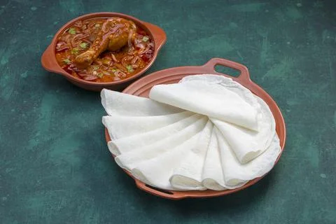 Nice Pathiri with chicken curry Stock Photos