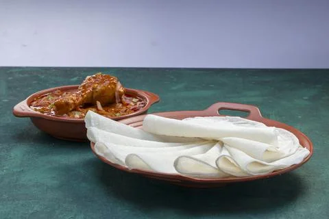 Nice Pathiri with chicken curry Foto stock
