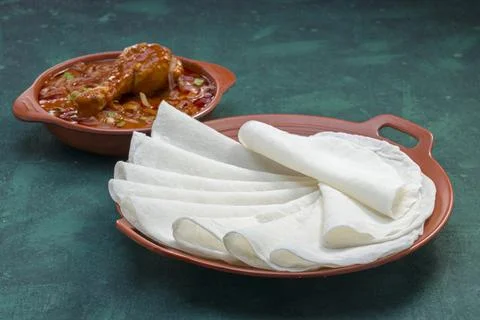 Nice Pathiri with chicken curry Stock Photos