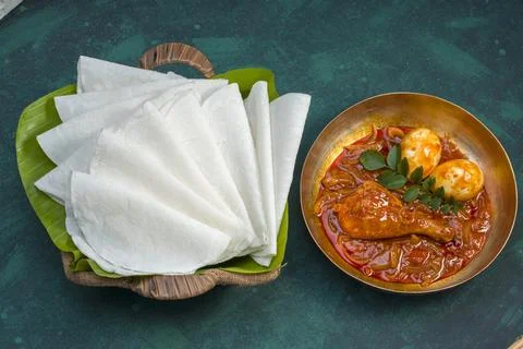 Nice Pathiri with chicken curry Stock Photos