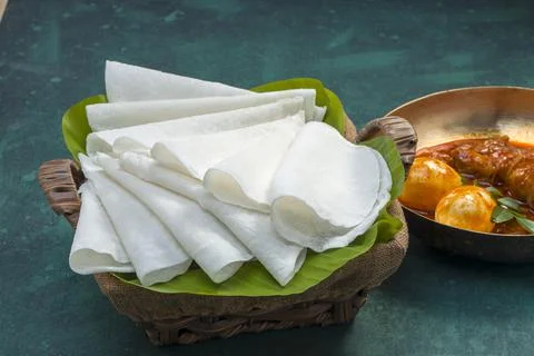 Nice Pathiri with chicken curry Stock Photos