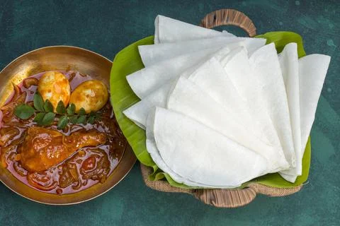 Nice Pathiri with chicken curry Stock Photos