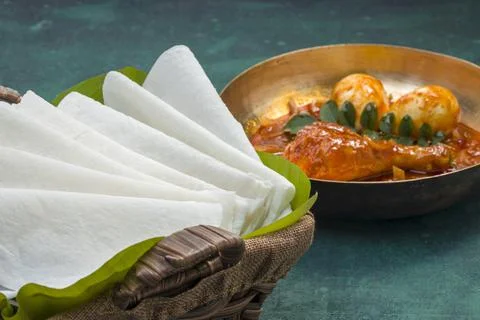 Nice Pathiri with chicken curry Stock Photos