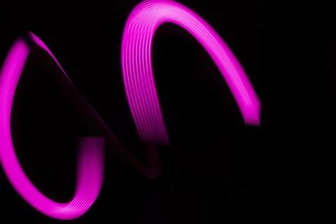 Nice pink lines on a black background with space for text. Stock Illustration