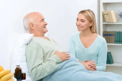 Nice pleasant conversation of two relatives at hospital Stock Photos
