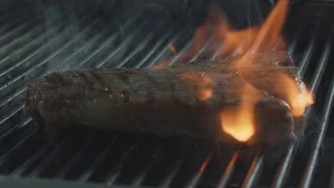 Nice pork steak is burning on a frying surface Stock Footage 128830367