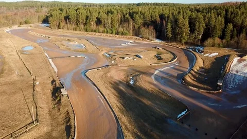 A nice pull away shot of the forest and the frozen race track closed for Video stock 116766746