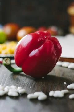 Nice ripe fresh bell papper on wooden table ready to eat - organic and healthy. Stock Photos