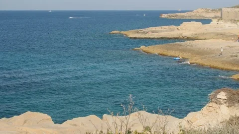 Nice rocky shore landscape. Sunny summer day. Stock Footage