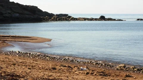A nice sandy ocean cove and a beach Stock Footage 55857306