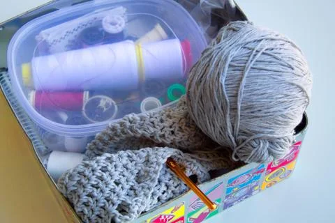 Nice sewing box with creative wool sweater Stock Photos