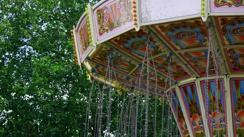 A nice spinning antique carousel top at the Amusement Park in UK Stock Footage 111362111