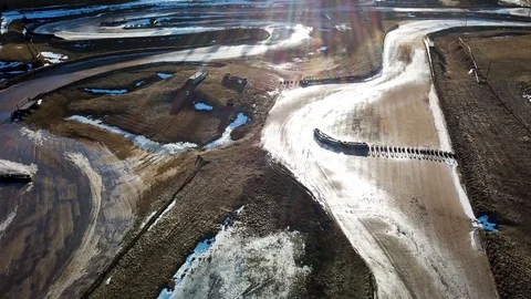 A nice steady pull away shot of an icy race track that is closed for the Video stock 116627511