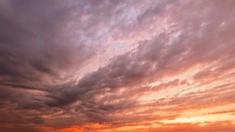 Nice sundown golden clouds on the sky bg - photo of nature Stock Photos