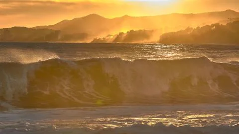 Nice sunlight in a windy sunset over the waves in Costa Brava of Spain Stock Photos